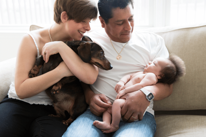 Couple with baby and their dog
