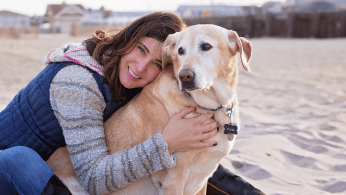 Woman with dog at Bradley Beach, NJ