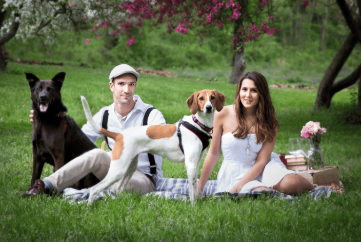 Couple with their dogs in Holmdel Park, NJ