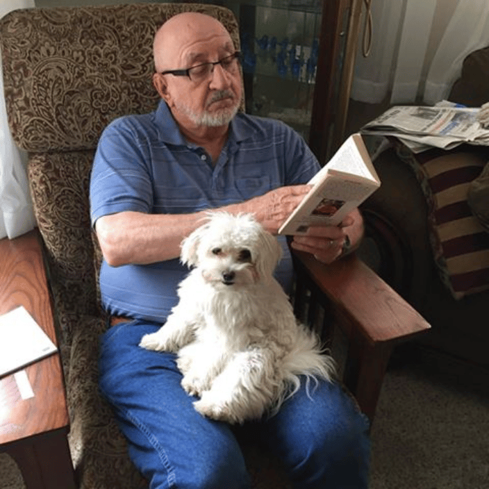 Dwain and Focus, our Maltese dog
