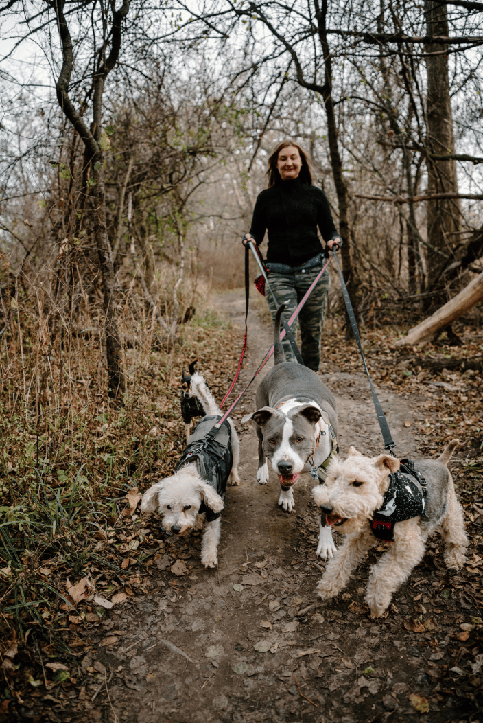 Lori hiking with dogs