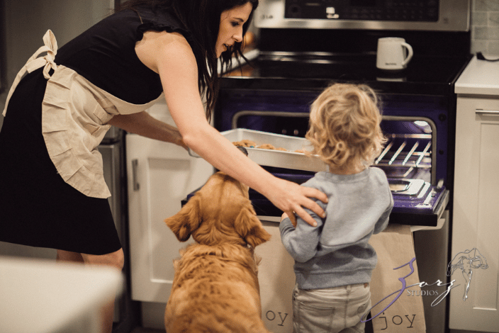 A lab smelling something delicious in the kitchen