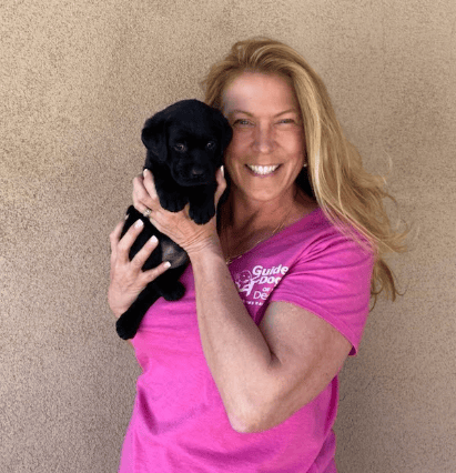 Robin with Black Labrador Puppy