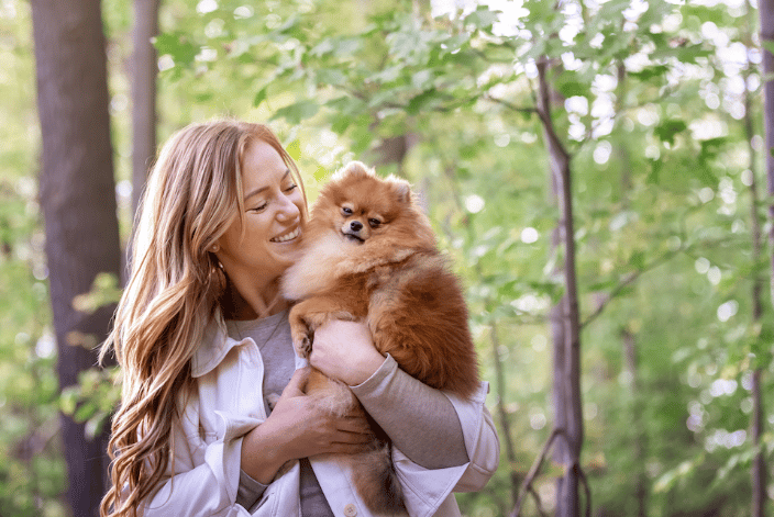 Lady and her toy Pomeranian