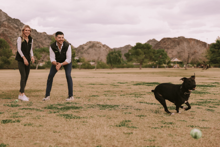 Connor and Hanna working with a pup on recall