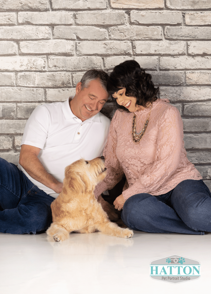 pet parents with bestie Golden Doodle