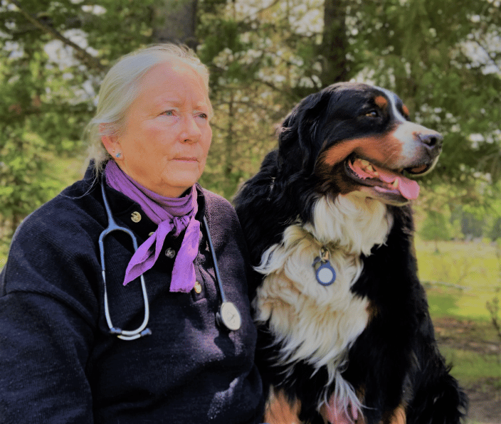 Dr. Jan Winderl and her Bernese mountain dog