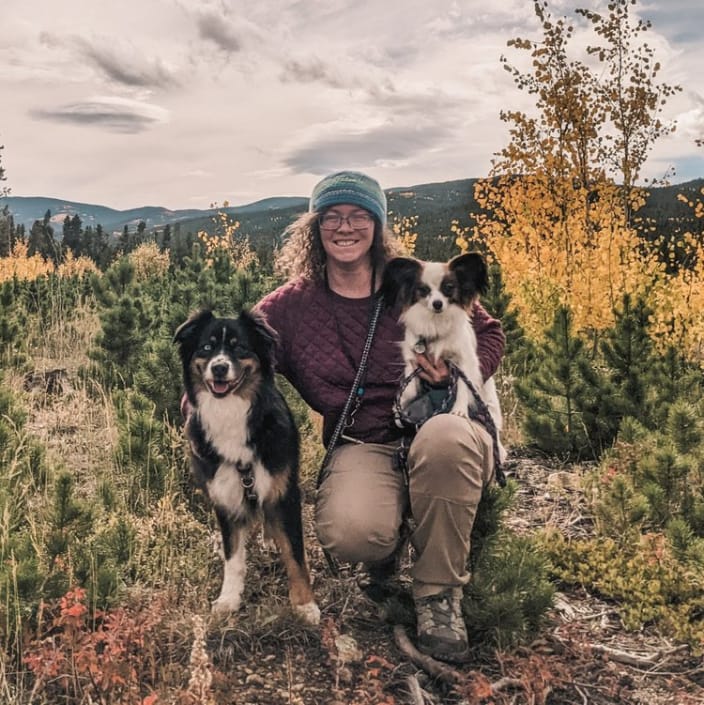 Morgan McMurdy and her dogs Reilly and Ayla enjoying an off leash hike in the CO mountains.