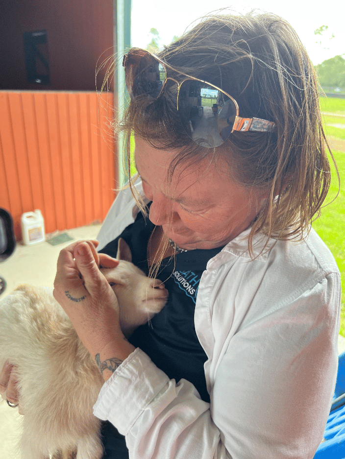Me working with a baby goat