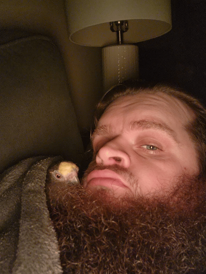 Me and my parrot Michael napping