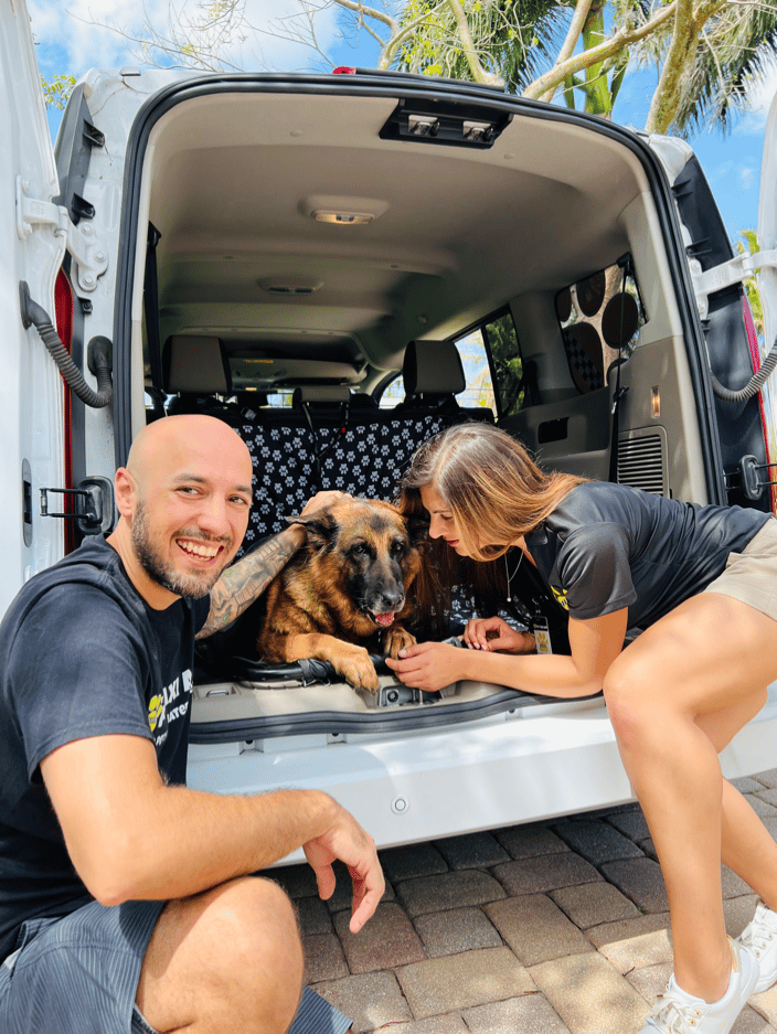 The Pet Taxi® getting to know their pet passenger, Tara.
