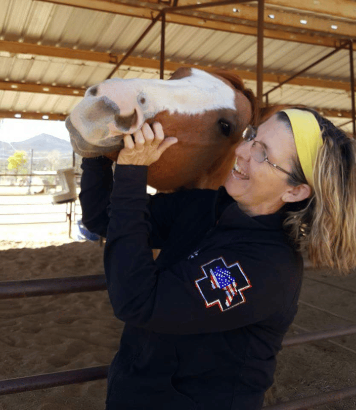 Teri Ann working with one of the Barn Hosts Horses