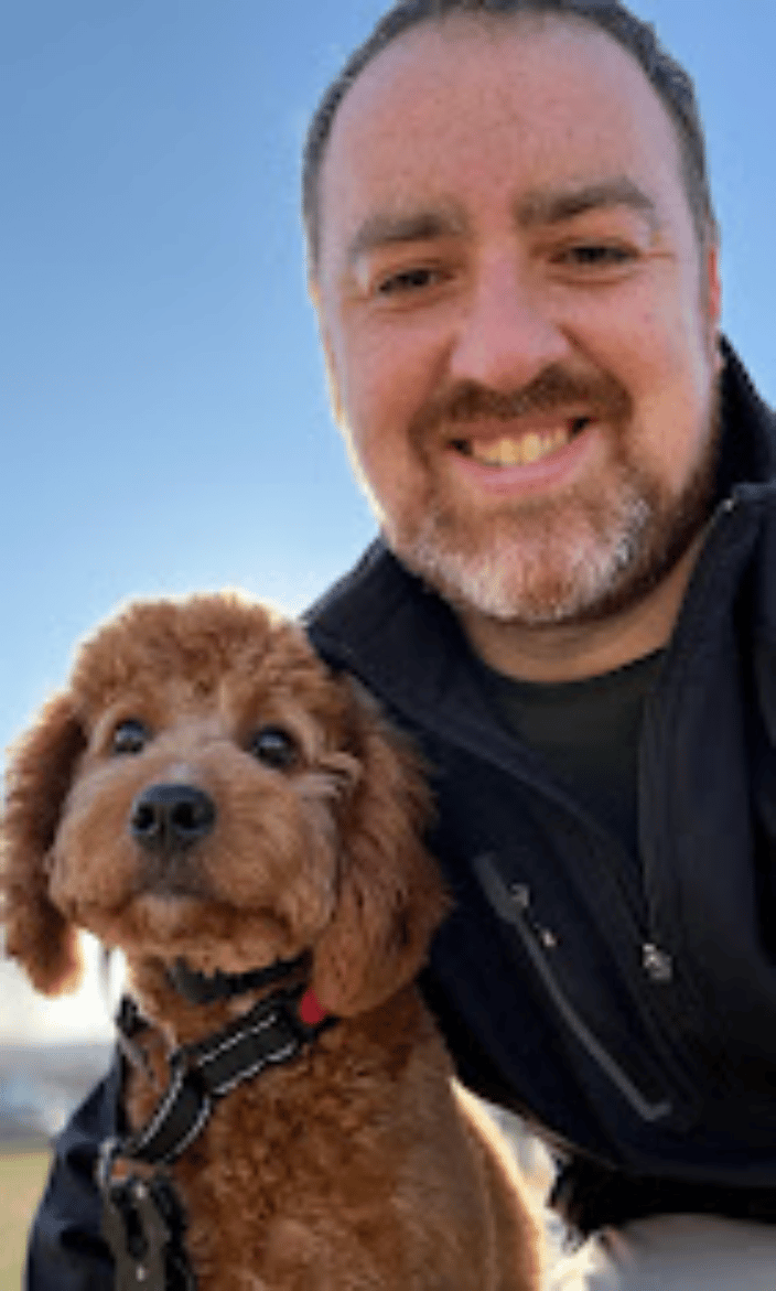 Rocco a puppy client with Benny - Noble Dog Training