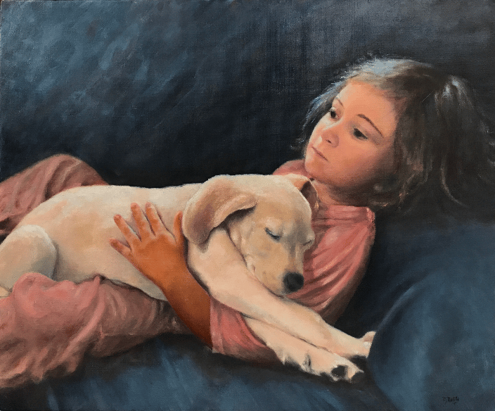 a little girl and her puppy